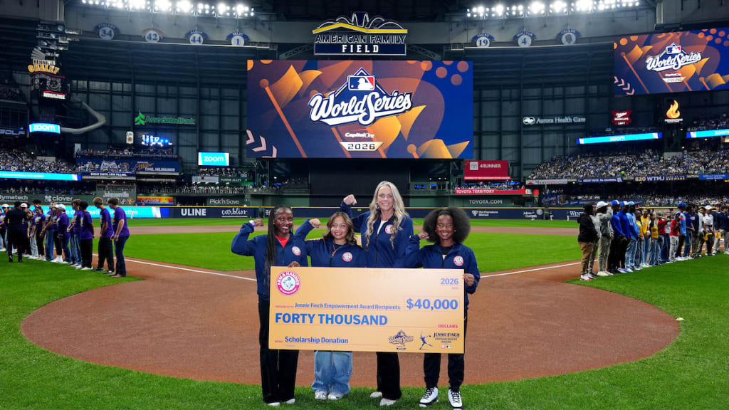 Jennie Finch and the Jennie Finch Empowerment Award recipients were presented a check from Arm & Hammer prior to Game Two of the 2026 World Series (Photo by Daniel Shirey/MLB Photos via Getty Images)