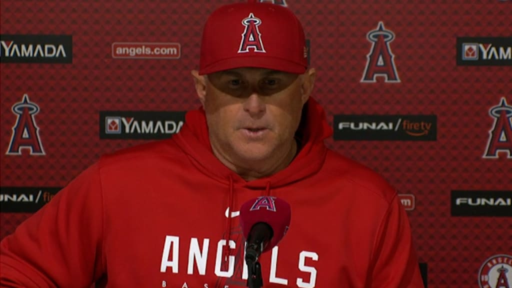 Shohei Ohtani of the Los Angeles Angels puts on a samurai warrior helmet,  the team's new home run celebration hat, after hitting a two-run homer in  the third inning of a baseball