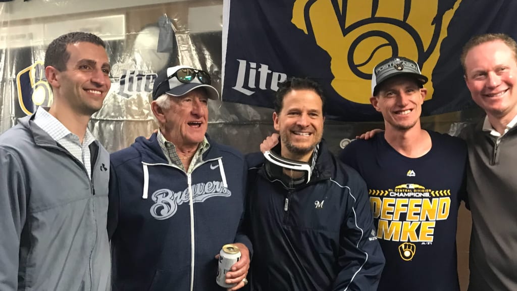 David Stearns, Bob Uecker, Mark Attanasio, Craig Counsell, Matt Arnold in the visitors' clubhouse at Wrigley Field after Game 163 in 2018