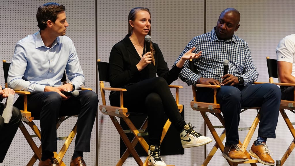 Elizabeth Benn speaks to the crowd during the MLB Athletes to Executives panel at MLB headquarters on Thursday. (Photo by Katherine Woolson/MLB Photos via Getty Images)