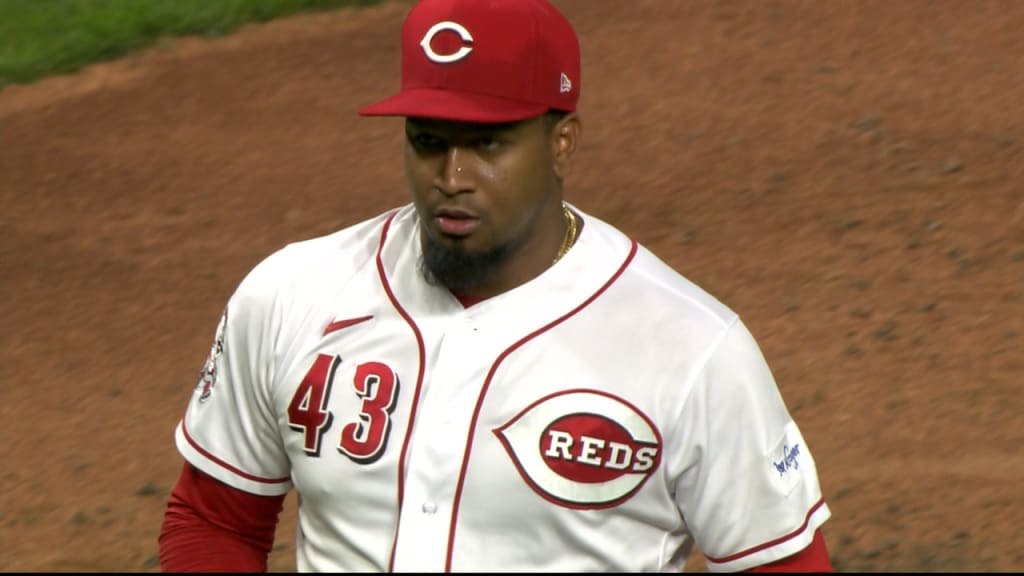 Reds rookie halts Marlins' win streak at four