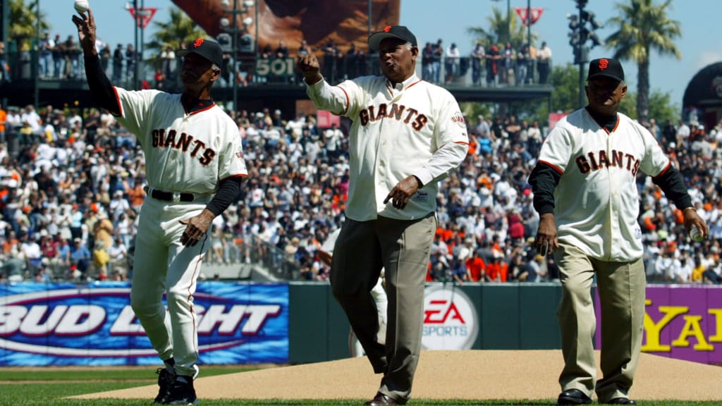 Felipe, Jesús and Matty Alou throw out the ceremonial first pitch on Opening Day in San Francisco in 2003. Felipe Alou was the manager of the Giants.