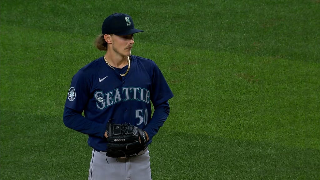 Bryce Miller K's Evan Carter to strand two runners
