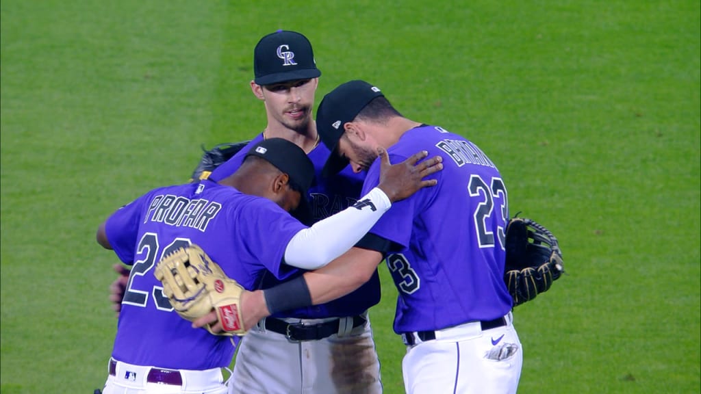 Here to help: Rockies catcher Elias Diaz extends a hand to his