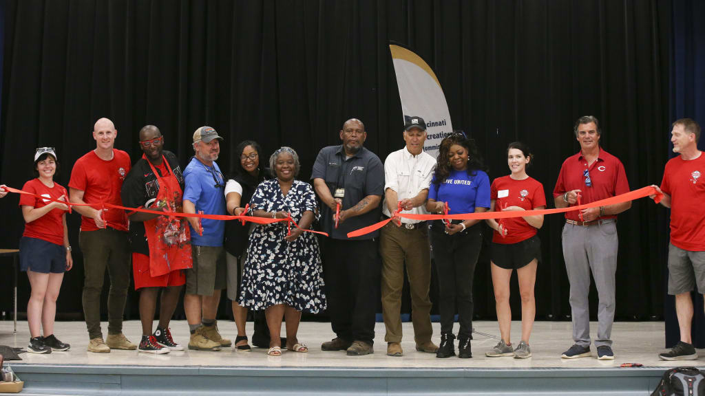 Reds Community Fund Presents New Baseball Uniforms to Shroder