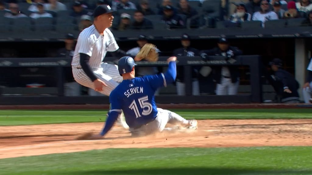 Brian Serven scores on a wild pitch
