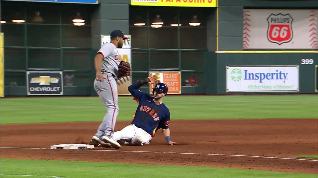 Kyle Tucker swipes third base