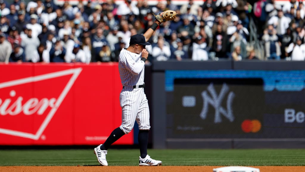 Standing nearly a foot shorter than Aaron Judge, Anthony Volpe is certain to look up to the Yankees’ captain for guidance as he learns the Major League ropes. But he’s also a quick study; during his first Yankee Stadium “roll call,” Volpe borrowed one of Judge’s moves, kissing the NY on his jersey as he acknowledged the Bleacher Creatures who chanted his name. (Photo Credit: New York Yankees)