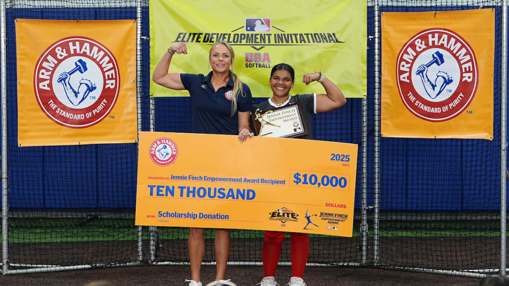 KANSAS CITY, MO - JUNE 24: Jennie Finch awards Marley Jackson with the Jennie Finch Empowerment Award sponsored by Arm & Hammer during the 2025 Elite Development Invitational at Kansas City Urban Youth Academy on Tuesday, June 24, 2025 in Kansas City, Missouri. (Photo by Kyle Rivas/MLB Photos via Getty Images)