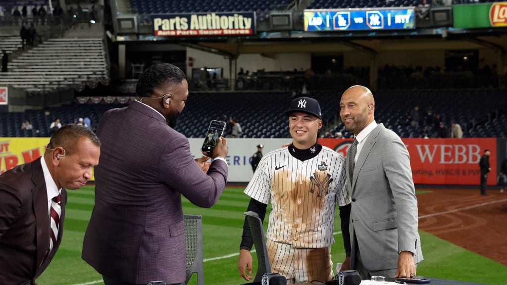 Back in 2009, an 8-year-old Volpe cheered on Derek Jeter \[R\] and the World Series–champion Yankees as they paraded through lower Manhattan. After Volpe’s grand slam in Game 4 of last year’s Fall Classic, two generations of pinstriped shortstops enjoyed a special moment at Yankee Stadium during Fox’s postgame broadcast. (Photo Credit: New York Yankees)