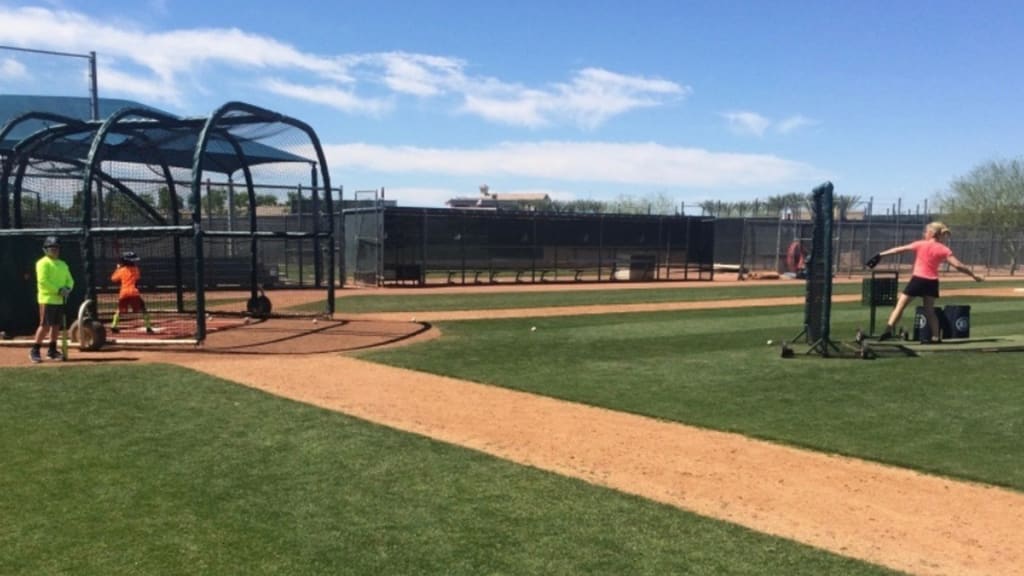Mentink throwing batting practice