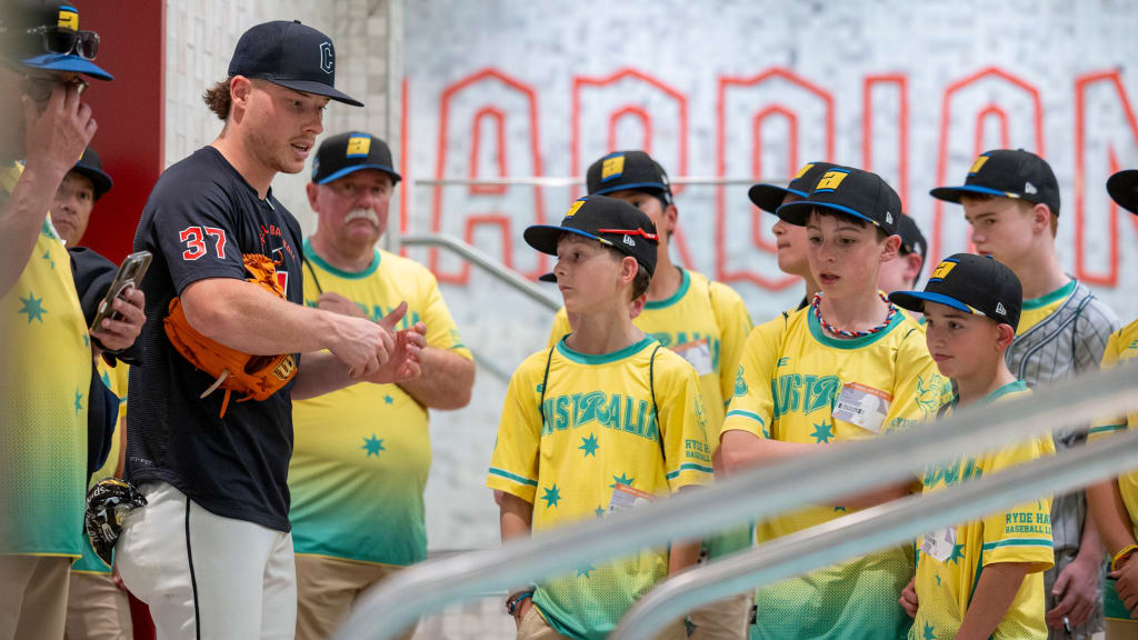 Travis Bazzana shows the Ryde Hawks Australian Little League team around Progressive Field. (photo via Russ Lee/Cleveland Guardians)