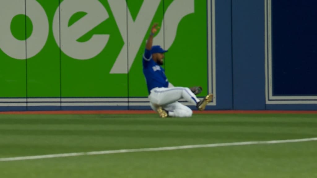 Josh Donaldson sees easy catch go right through the webbing of his