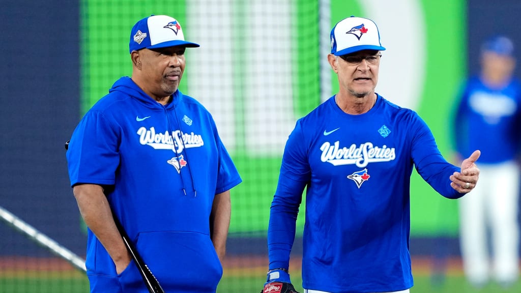 Blue Jays associate manager DeMarlo Hale, left, and then-bench coach Don Mattingly look on during batting practice before the World Series in 2025.