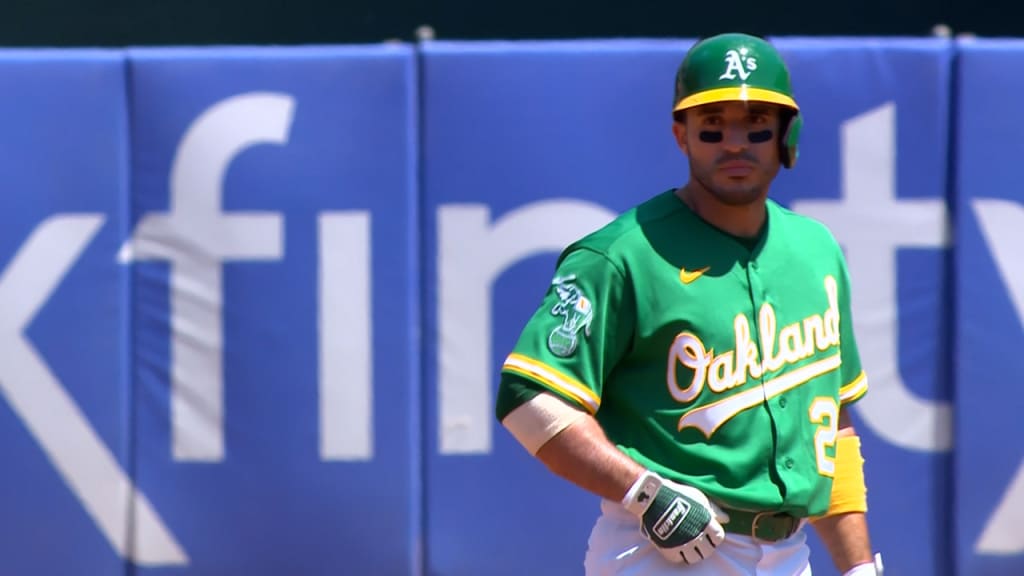 Oakland Athletics' Ramon Laureano, left, is tagged out by Houston