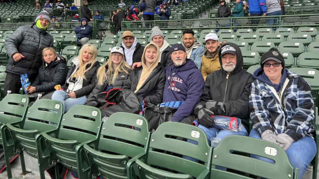 Joey Wiemer's mother (third from the left) and father (third from the right) take in their son's debut with family and friends. (photo via Adam McCalvy)