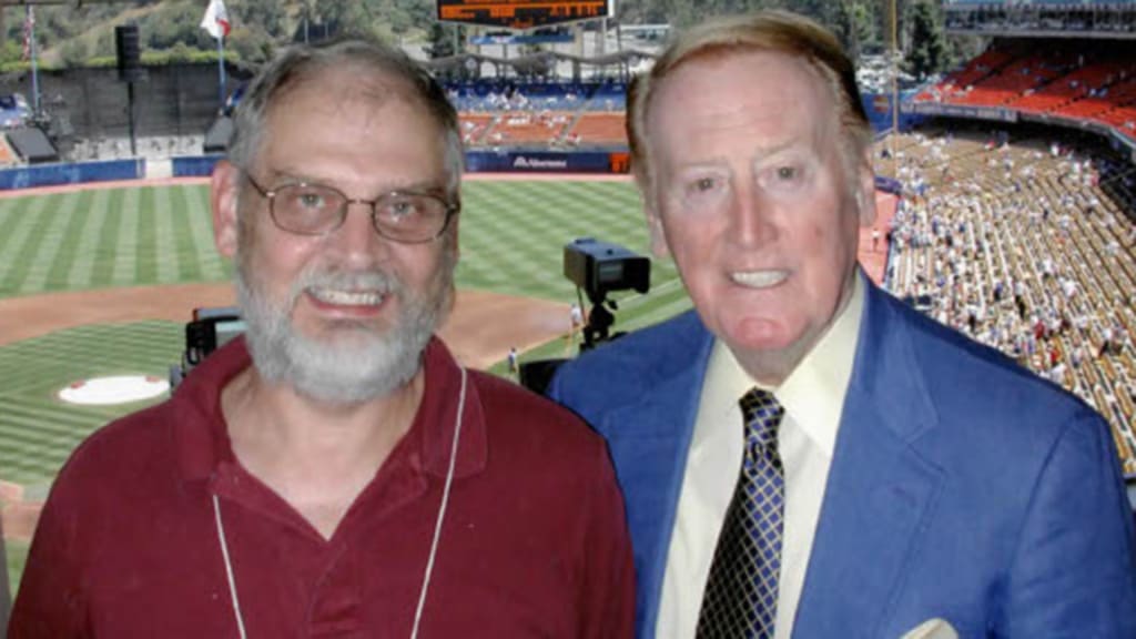 Smith gave Dodgers announcer Vin Scully a copy of his recording of Koufax's perfect game upon meeting him prior to a game in 2003. A gracious Scully told Smith: "I have lots of Dodger memorabilia, but this will be special for my grandchildren." (Courtesy: Dave Smith)