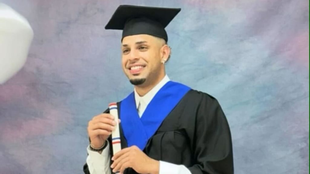 Christopher Morel at his high school graduation