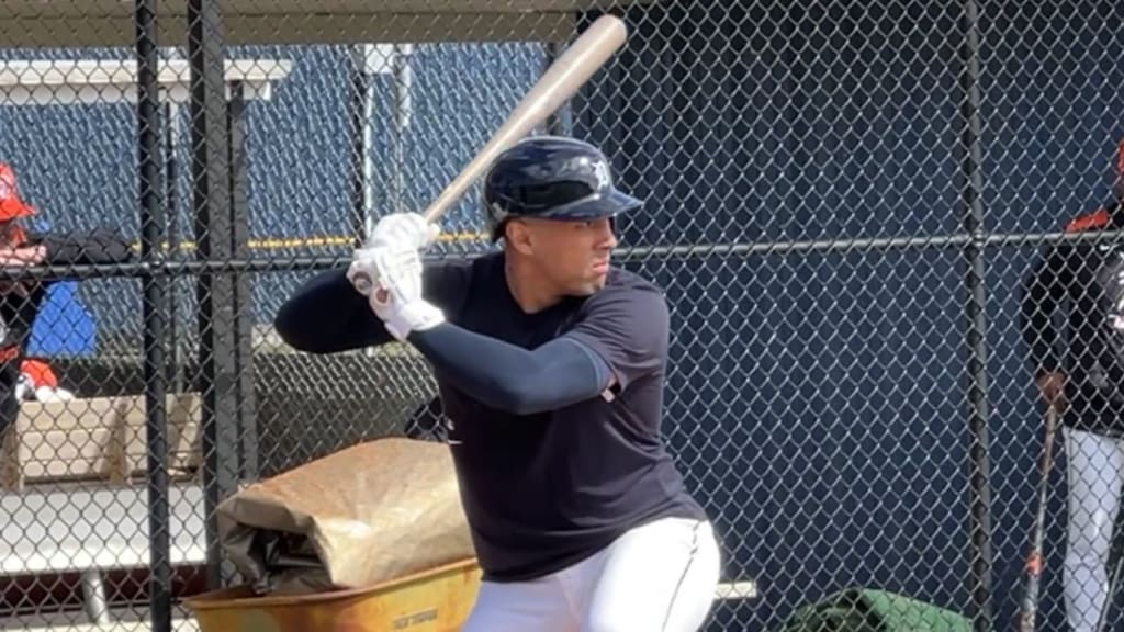 Jahmai Jones takes some swings during spring camp.