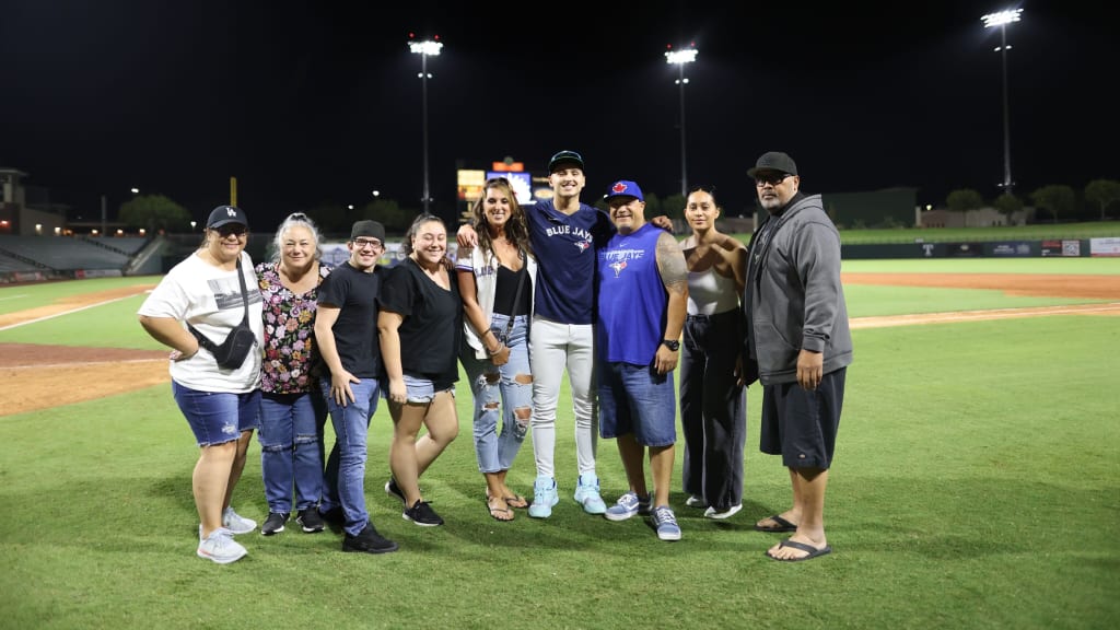 The Tiedemann family gathers around the top Blue Jays prospect after the game.