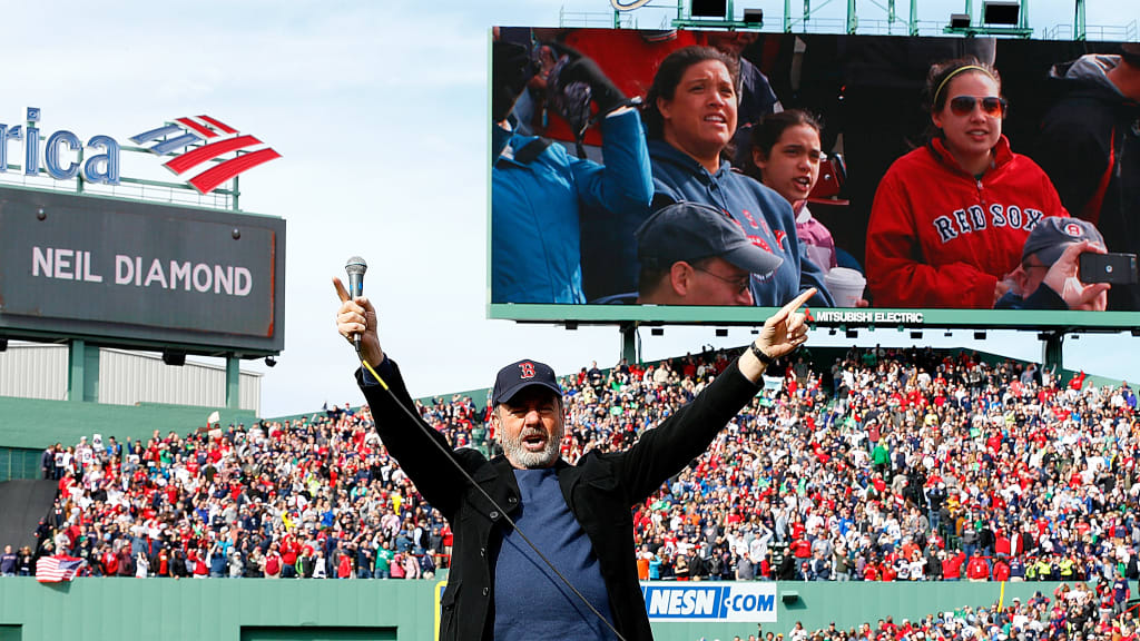 Neil Diamond leading the fans at Fenway Park in a rendition of "Sweet Caroline" in 2013.