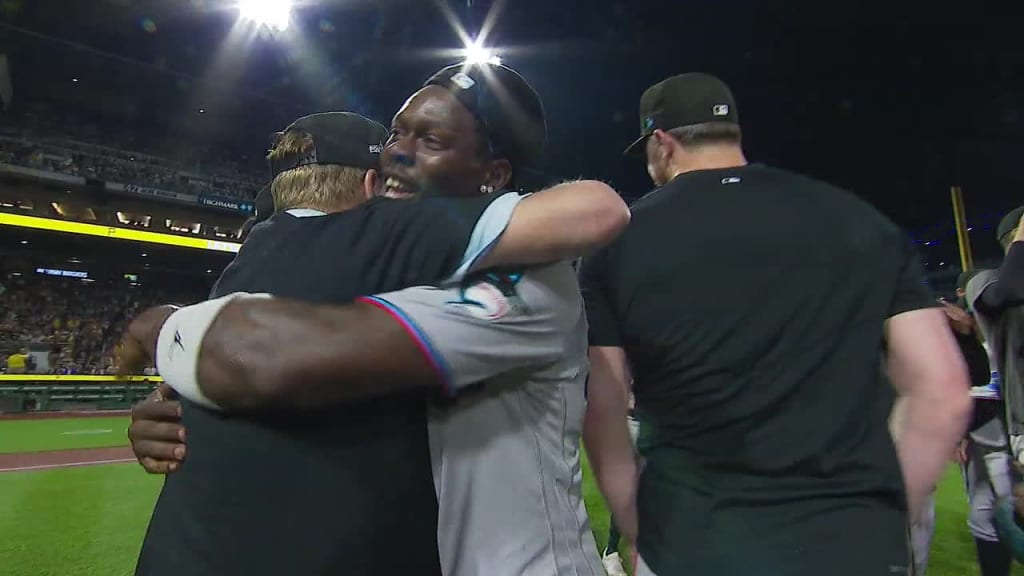 Marlins clinch playoff spot with 7-3 win over Pirates