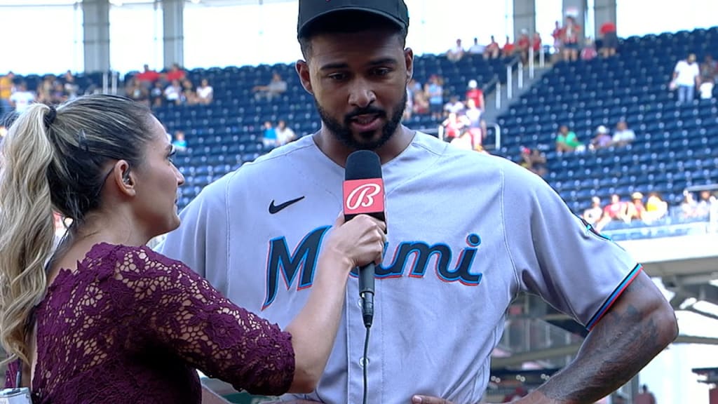 Told my gf (on rt) to wear shorts & tee shirt to the Mets/Marlins