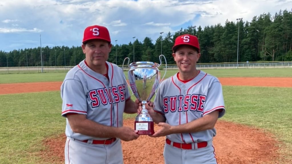 Manager Chris Byrnes with his brother and team coach, Tim.