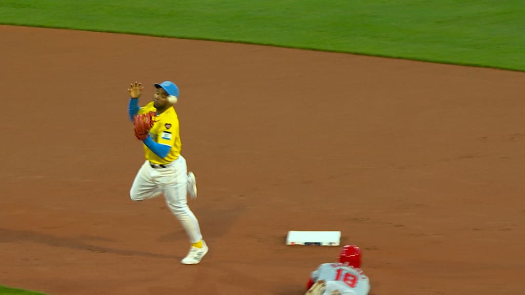 Mike Trout reaches on a throwing error