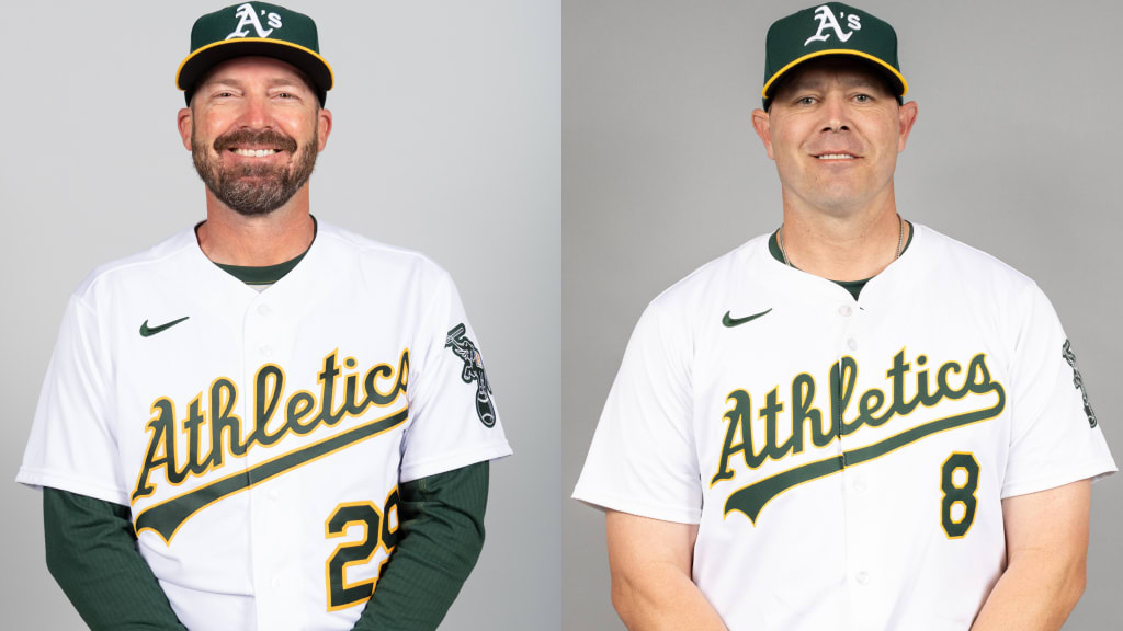 Ryan Christenson (left) has spent 16 seasons in the A's organization; Bobby Crosby is the new third-base coach. (Getty)