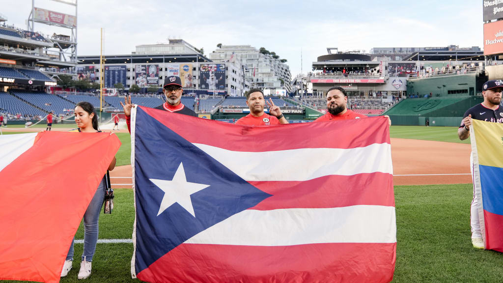 Ricky Bones with director of team travel Kenny Diaz and clubhouse manager Carlos Felix