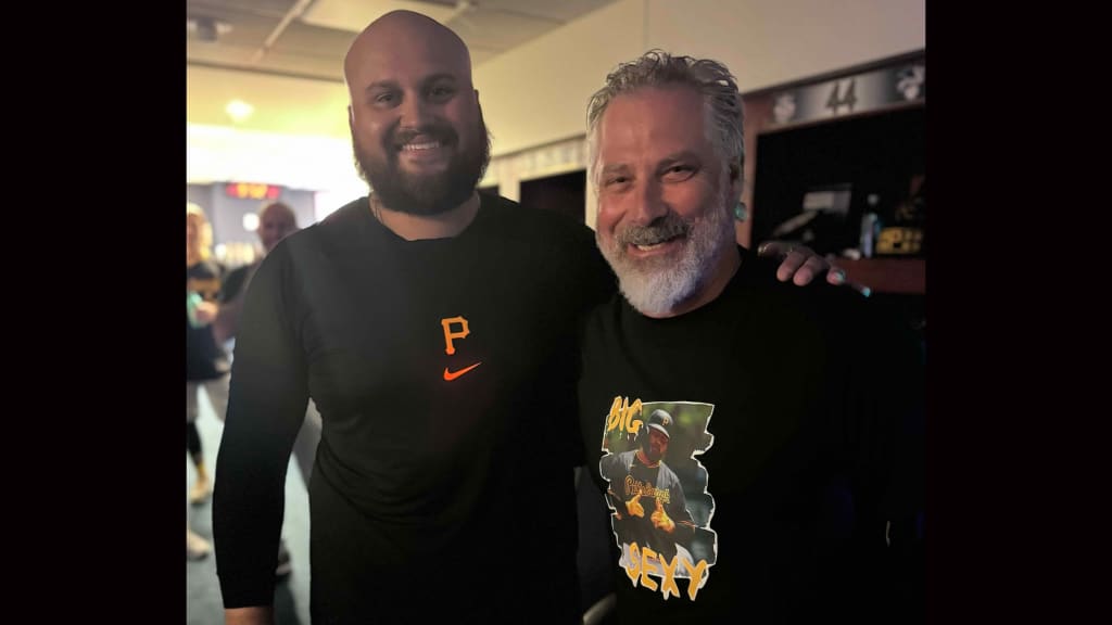 Derek Shelton shows off his Rowdy Tellez T-shirt alongside the man himself. (Photo via Patrick Kurish, Pittsburgh Pirates)