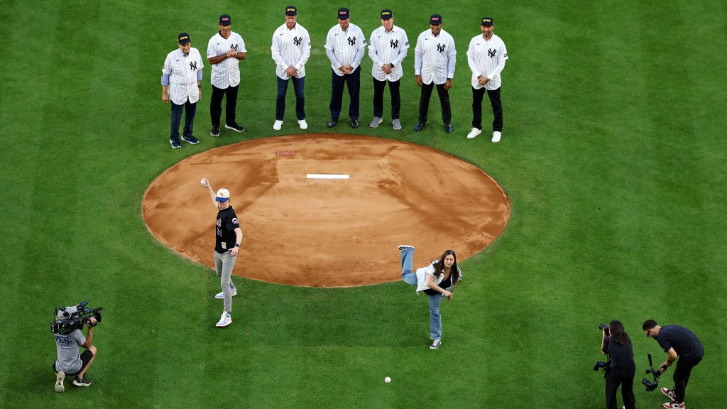 The memories of 9/11 can be overwhelming for Brielle Saracini (above R), who contemplated how best to honor her father, Capt. Victor J. Saracini, on the 25th anniversary. When the Yankees extended an invitation to throw out ceremonial first pitches to her and her husband, Sean McGuire (above L) whose father was also killed in the attacks, it felt like “I’m in the right place today,” she said. It was also a chance to reconnect with Jeter, who has remained a friend since inviting a 10-year-old Saracini to Yankee Stadium 25 years ago.
