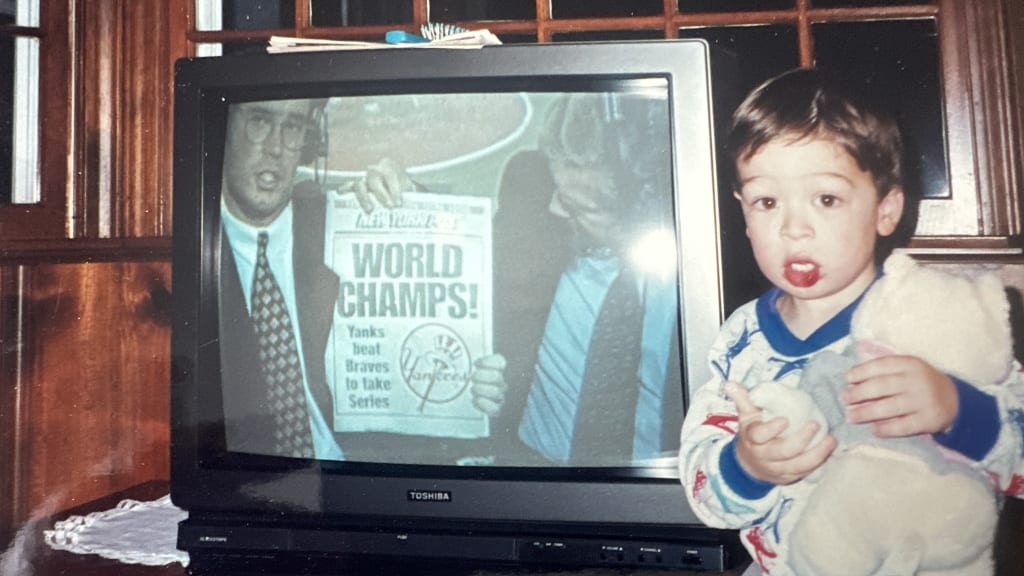 2-year-old Nate after the Yankees won the World Series in 1996.