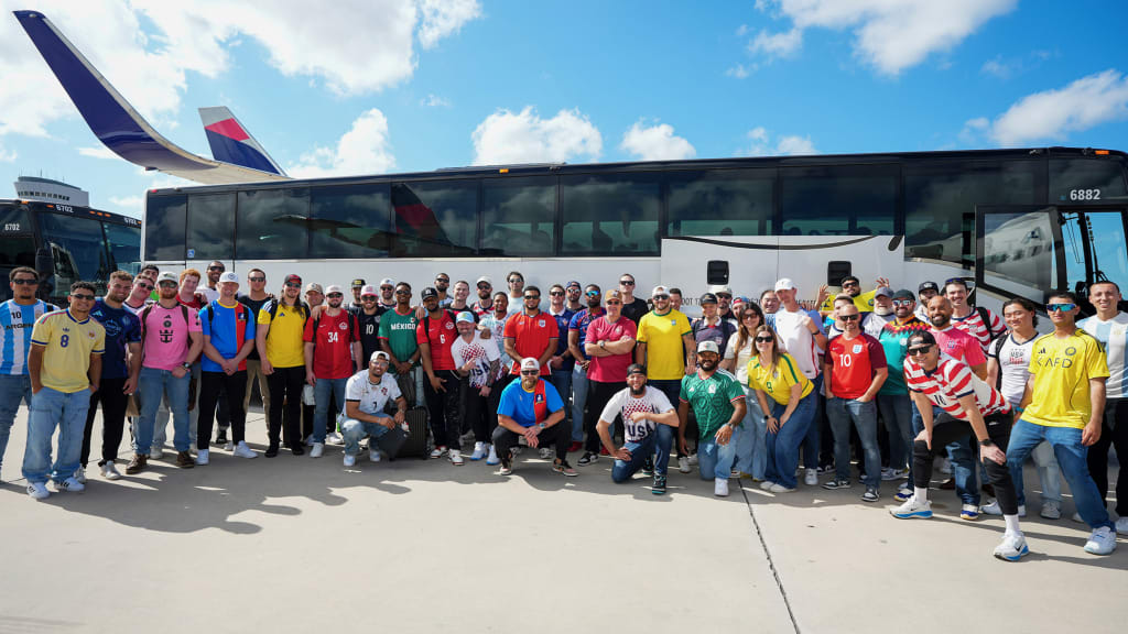 Marlins celebrate World Cup on travel day with jerseys. (Photo by: Jasen Vinlove/Marlins)