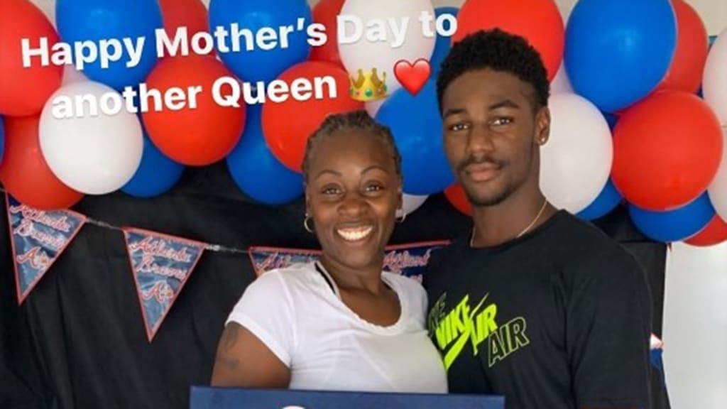 Michael Harris II with Michael Cloud’s mother Candy Smalls