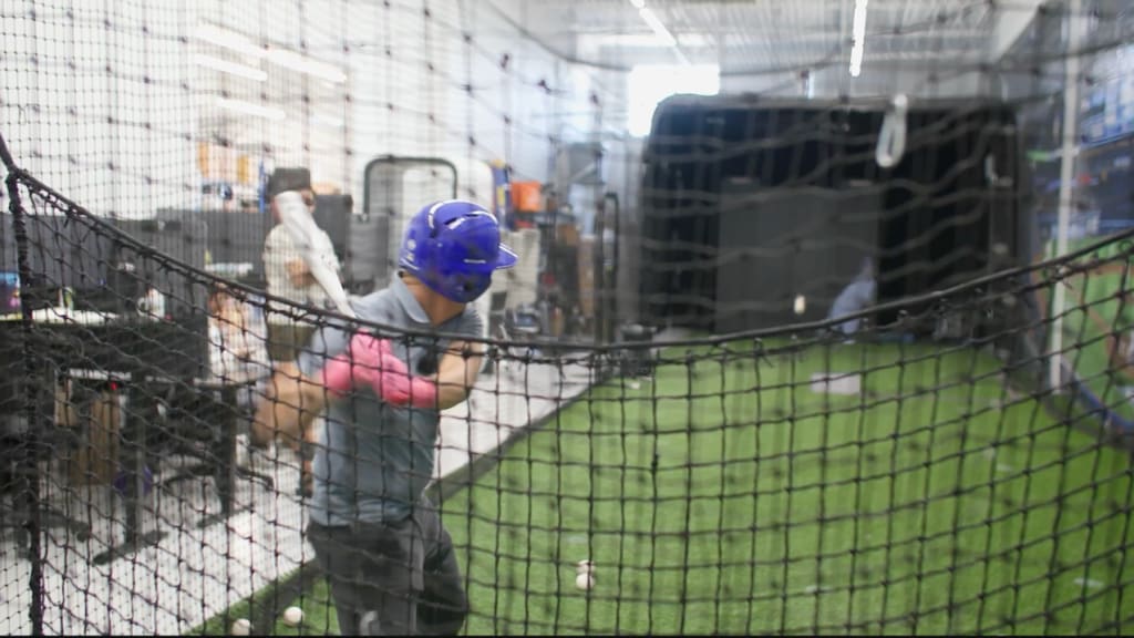 Anthony Castrovince stands in against a 105 mph fastball (he made contact!)