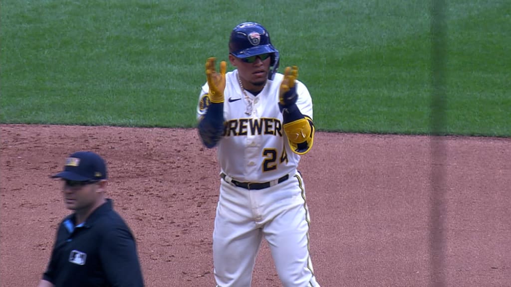 The Milwaukee Brewers score two runs on a pair of fielder's choice