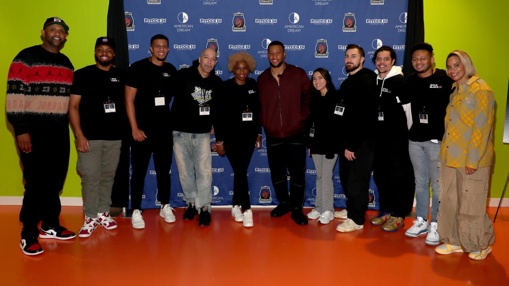 Members of MLB's Black ERG with CC and Amber Sabathia and Saquon Barkley. (Denis Kennedy/MLB)