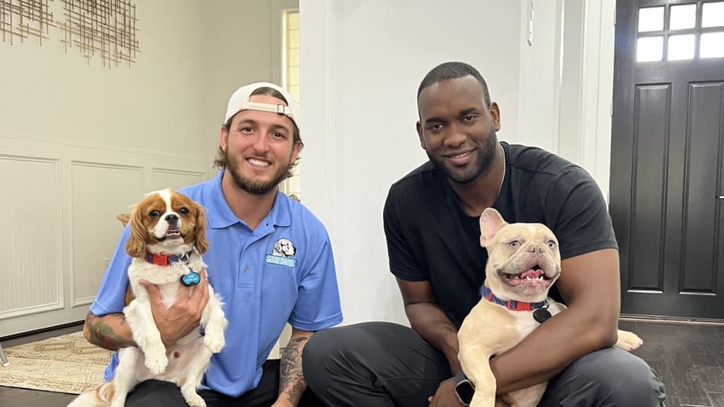 Wesley Dawe with Yordan Alvarez and Alvarez's dogs, Luka and Milo. (Courtesy of Wesley Dawe)