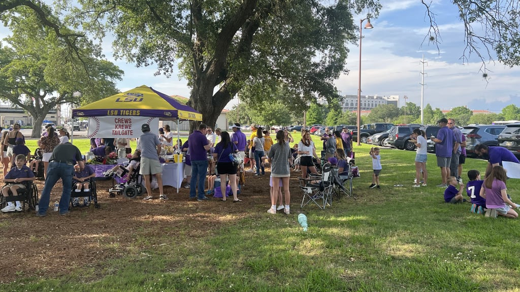 Families impacted by Dylan Crews' kindness hold a special tailgate party.