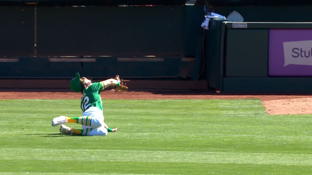 Oakland Athletics left fielder Tony Kemp misses a diving catch of