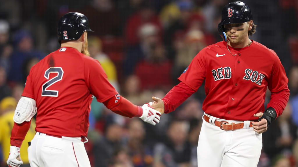 Justin Turner (left) and Triston Casas (right)
