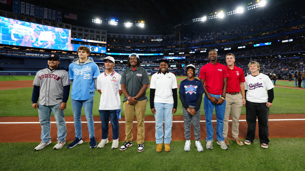 Texas Rangers Youth Academy athlete Kaleb Thompkins (third from right) is recognized on-field alongside fellow ‘Youth of the Year’ winners at Rogers Centre in Toronto prior to Game 2 of the 2025 World Series on Oct. 25, 2025.