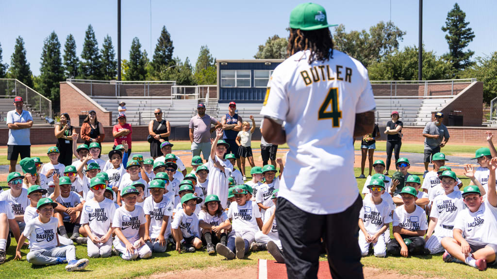 Lawrence Butler fields questions from the next generation of baseball players in Sacramento, Calif.
