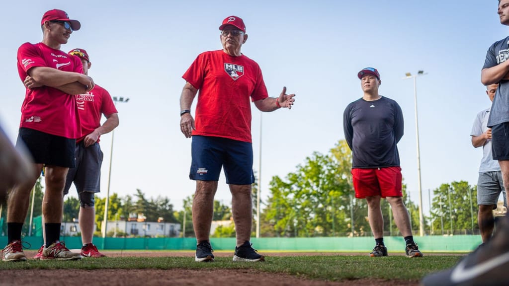 John McLaren, center, with the Polish national baseball team. Photo by Ladislav Svencik Photography