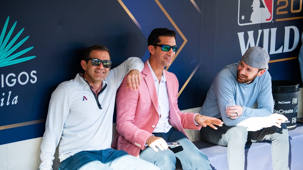 Sawdaye, Hazen and Fitzgerald share a moment in the dugout before the Wild Card Series. (Credit: Hazen family)