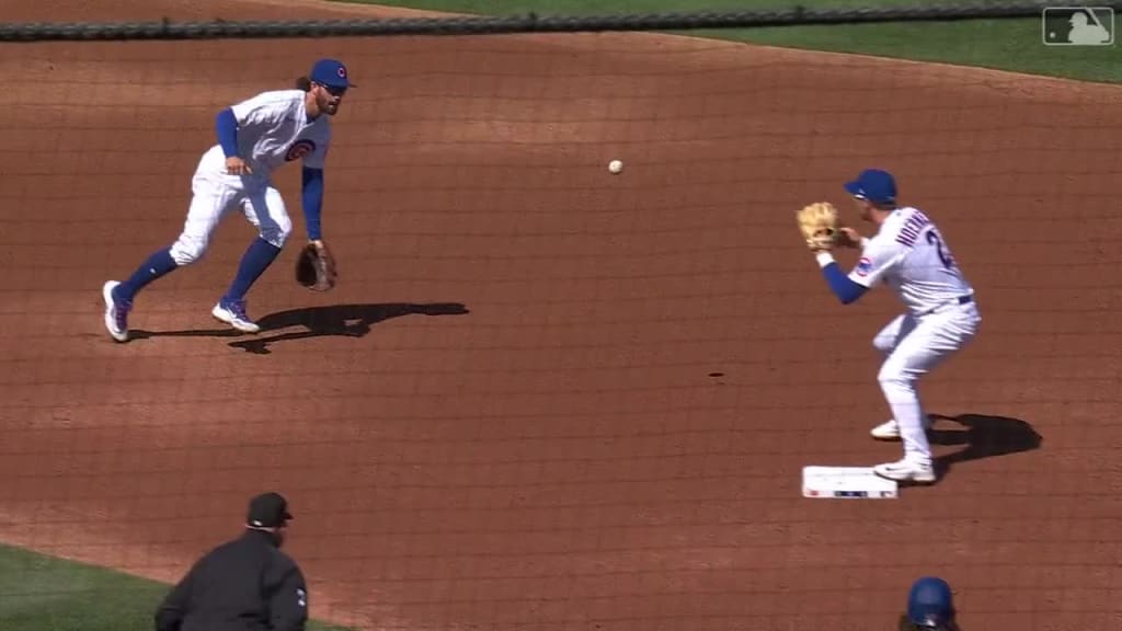 Hoerner, Swanson and Hosmer turn a double play during a Cubs Spring Training  game 