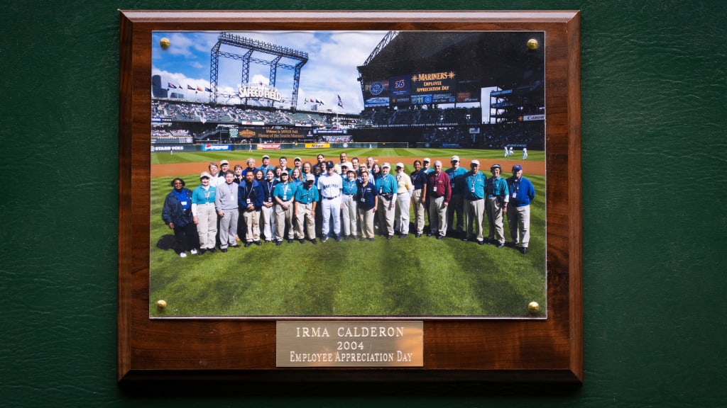 Irma Calderon’s MVP plaque features a group picture of the 2004 honorees with Edgar Martinez.