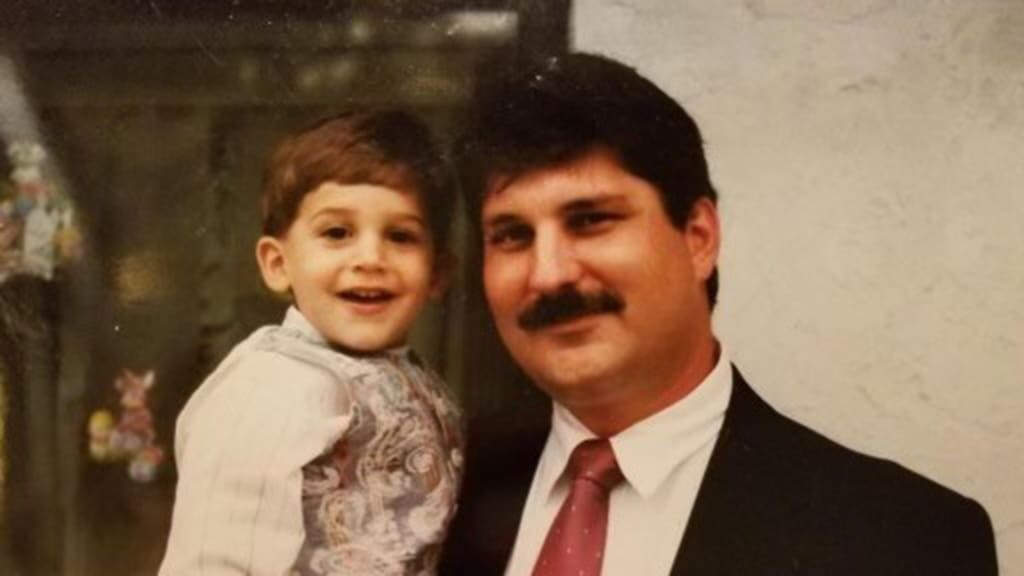 Zach Eflin (left) calls his father, Larry, "the rock of our family."